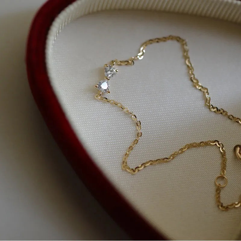 925 Sterling Silver 14K Gold Plated Zircon Bow Bracelet
